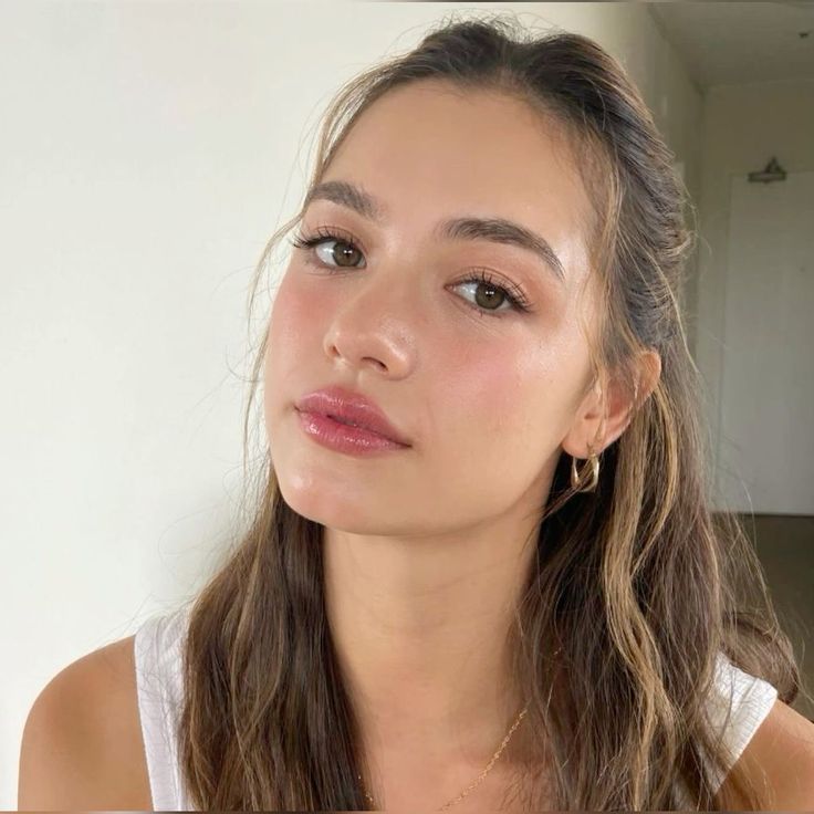 User avatar: A smiling man wearing a black cap